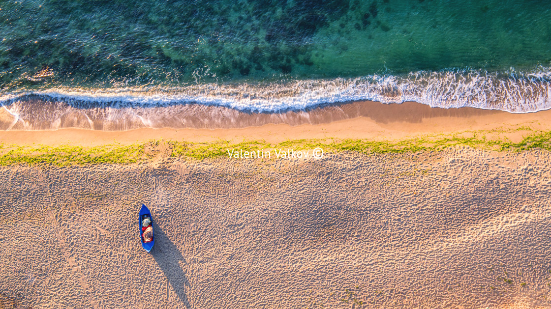 "Aerial view of ocean waves and sand on beach" stock image