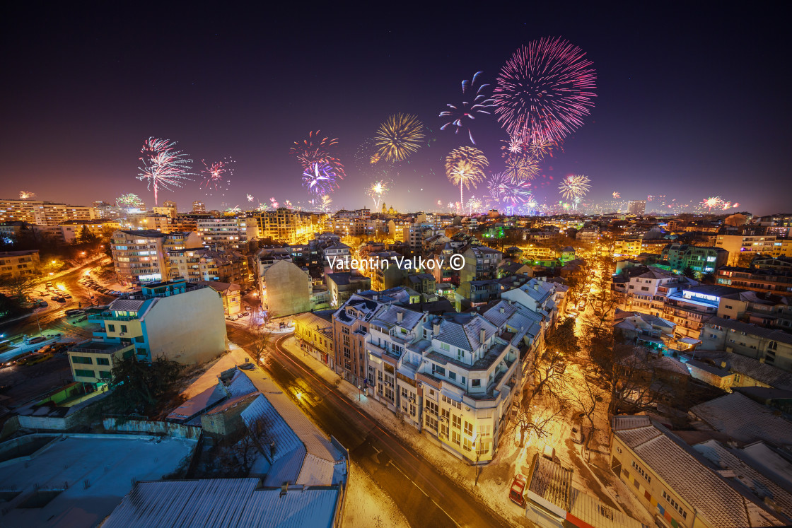 "Downtown Varna cityscape with many flashing fireworks celebratin" stock image