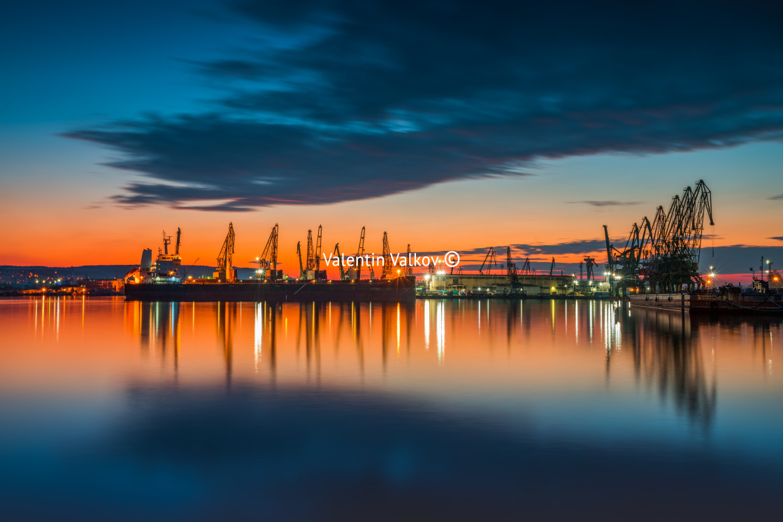 "Sunset over sea port and industrial cranes, Varna" stock image