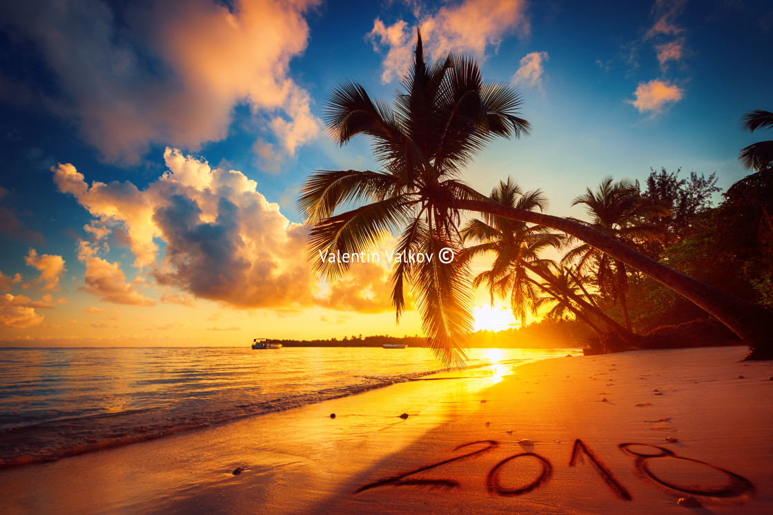 "Happy New Year 2018 concept, lettering on the beach. Sea sunrise" stock image