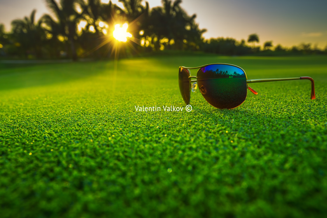 "Beautiful glasses on golf course" stock image