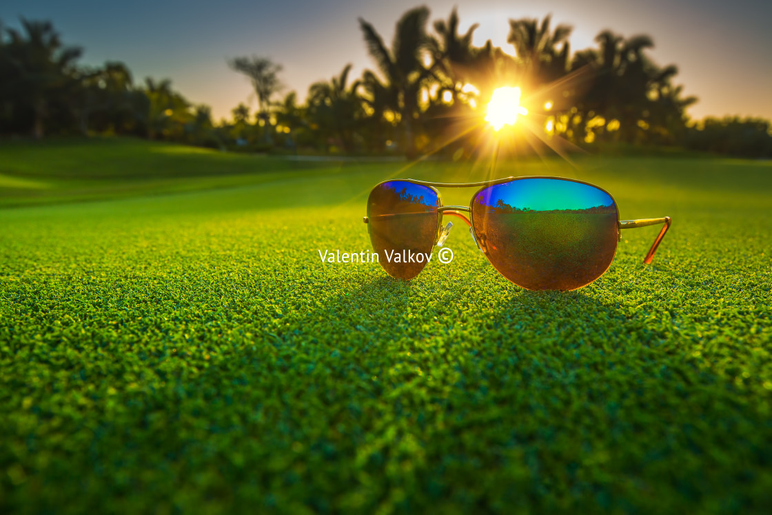 "Beautiful glasses on golf course" stock image