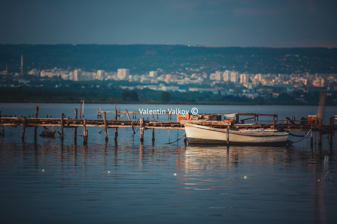 "Small dock and fishing boat at fishing village" stock image