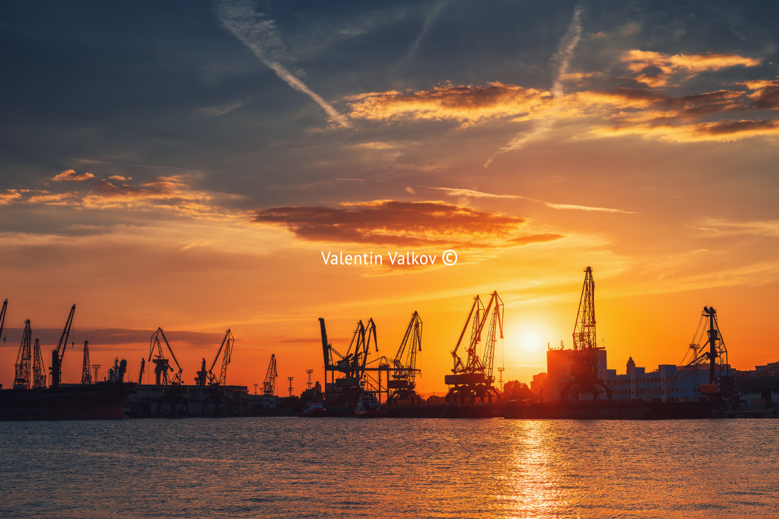 "Sunset over sea port and industrial cranes, Varna" stock image