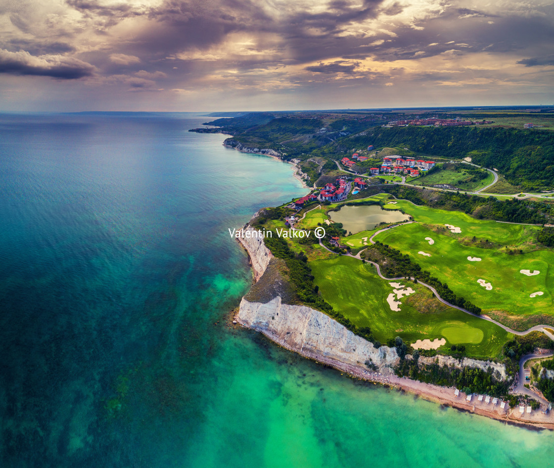 "Aerial drone view of a golf course next to the cliffs and Black" stock image