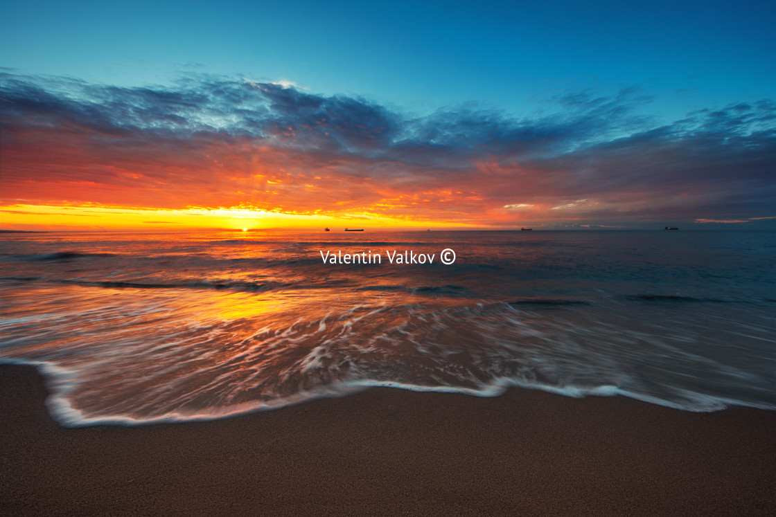 "Beautiful sunrise and big cargo ships sailing in Black sea again" stock image