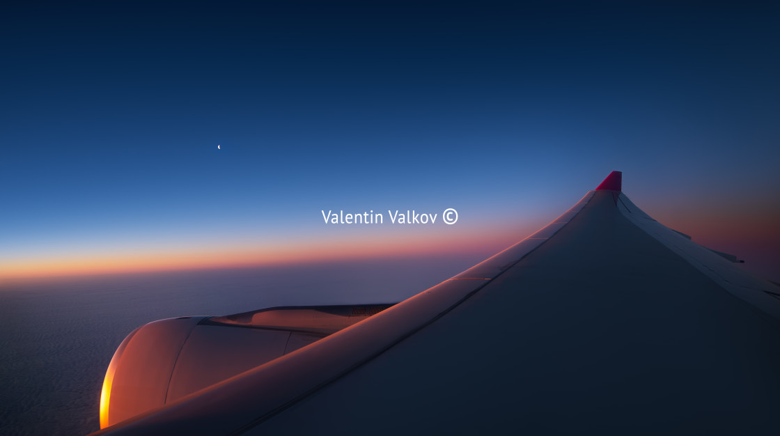 "Aerial view from the plane over fluffy clouds" stock image