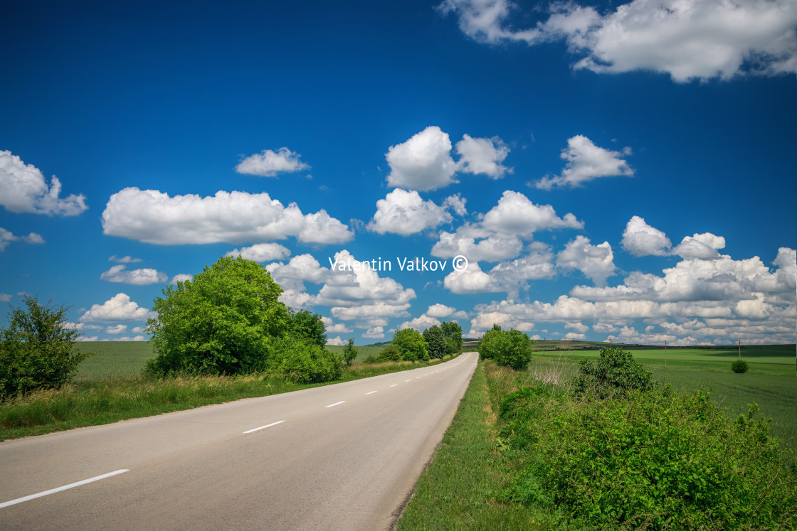 "Empty asphalt road with cloudy sky" stock image