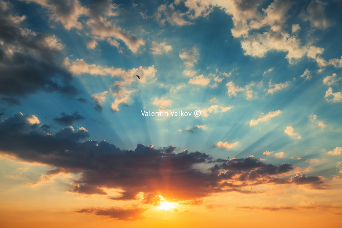 "Sunset dramatic sky clouds with sunbeam" stock image