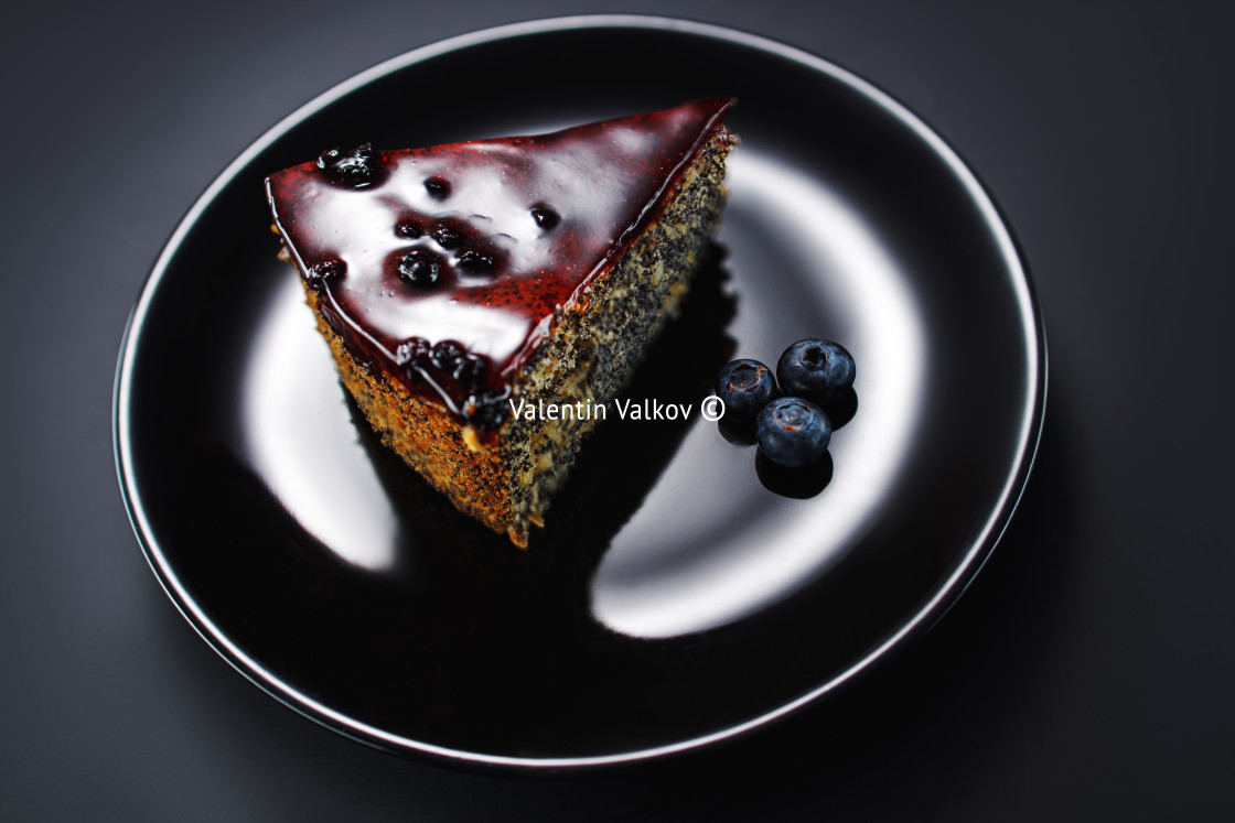 "Cake with berry fruits, chia cereals and nuts isolated in a plat" stock image