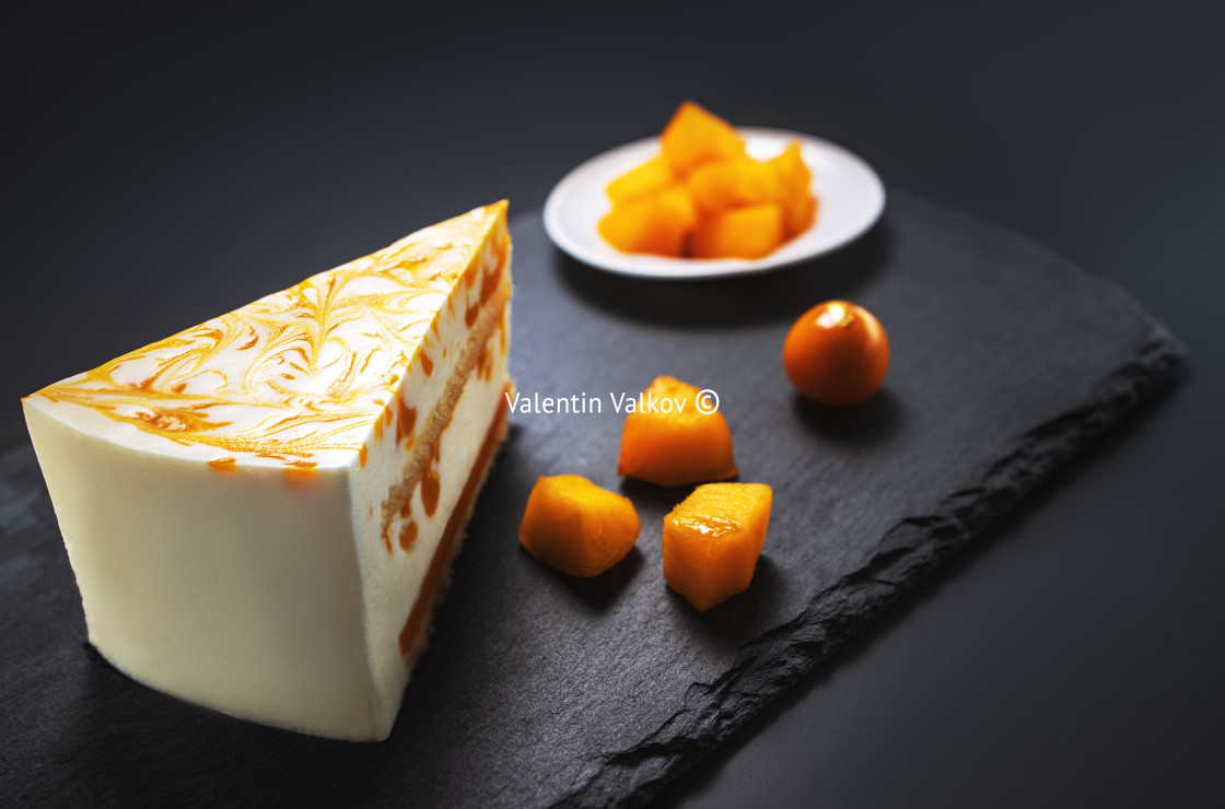 "Mousse cake with mango puree and cream" stock image