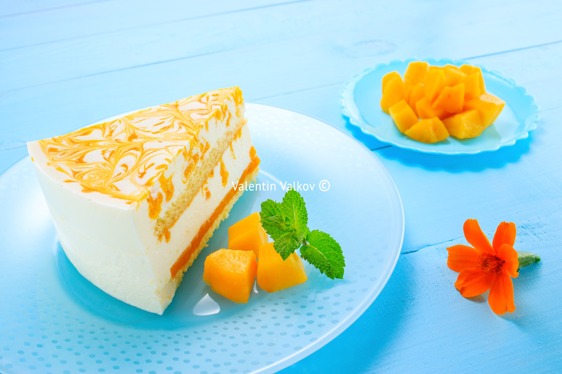 "Mousse cake with mango puree and cream" stock image