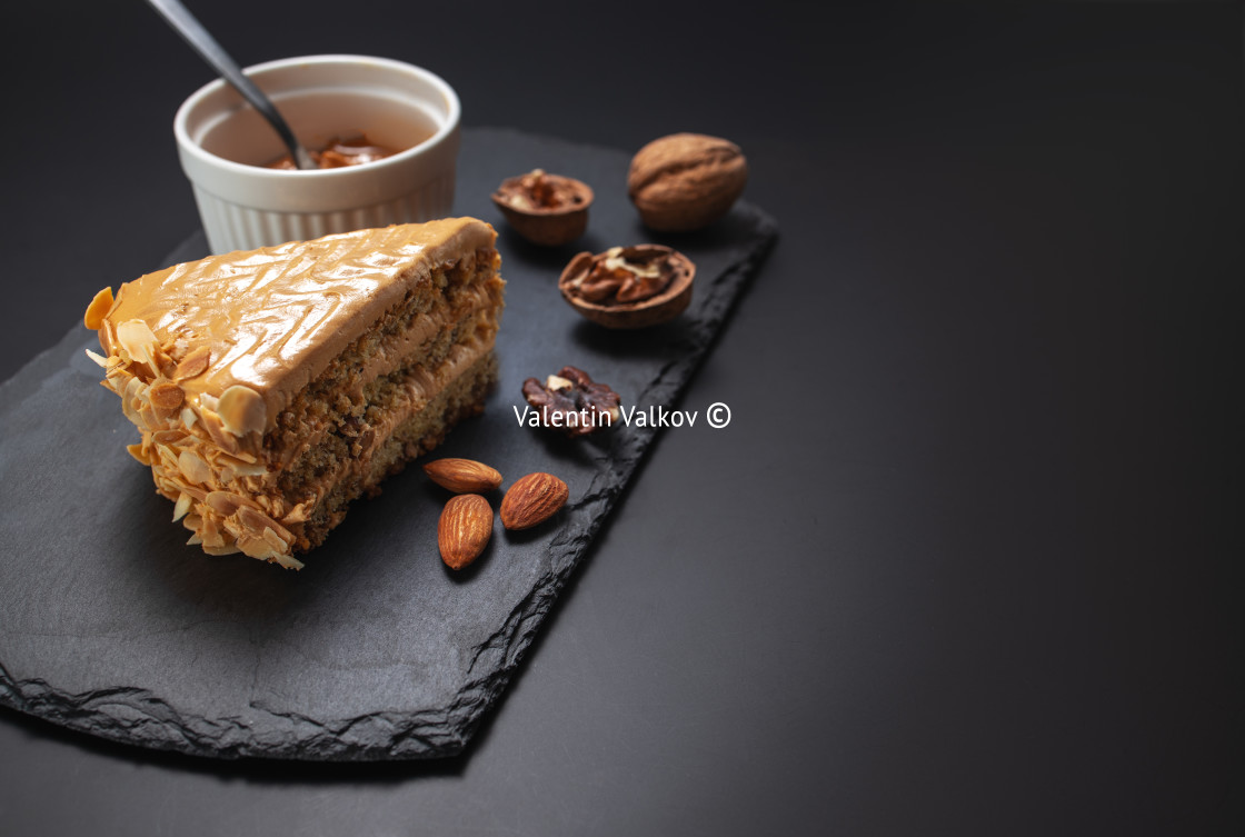 "Cake with peanuts, walnuts, chocolate and caramel cream" stock image