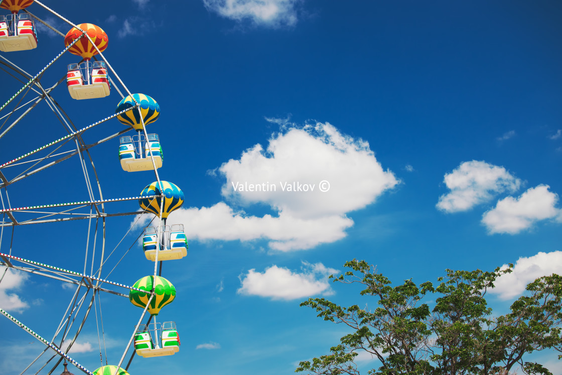 "Ferris Wheel with Blue Sky and clouds" stock image