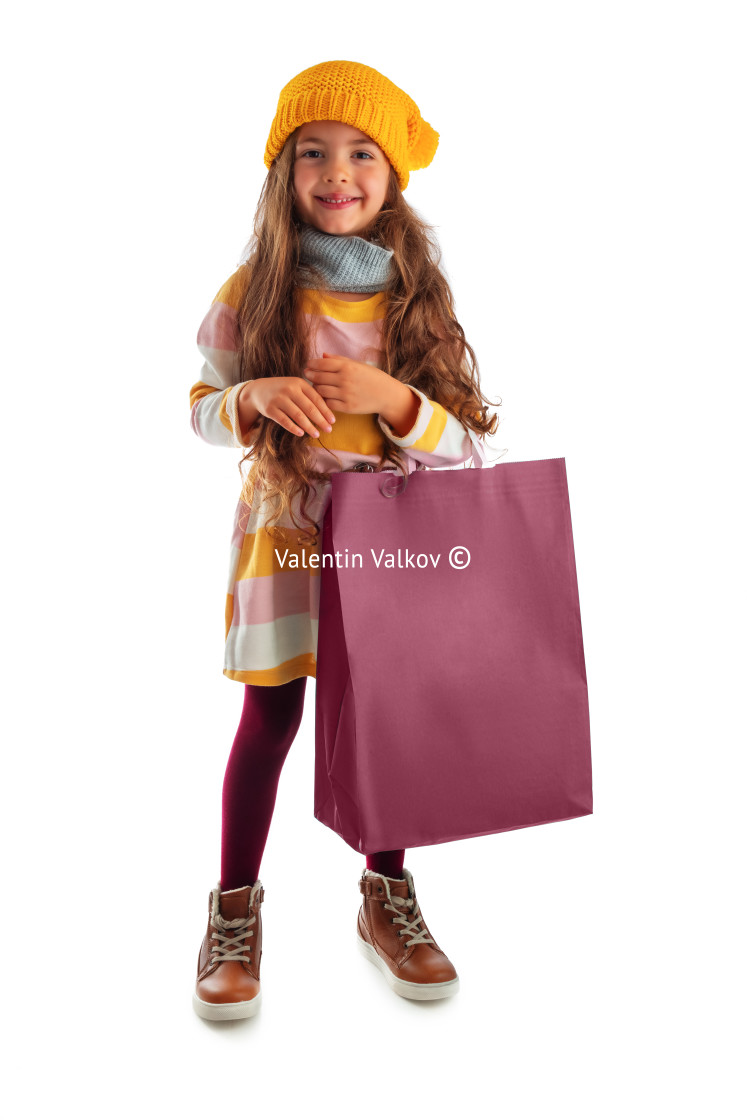 "Happy beautiful young girl with shopping bag, portrait on white" stock image