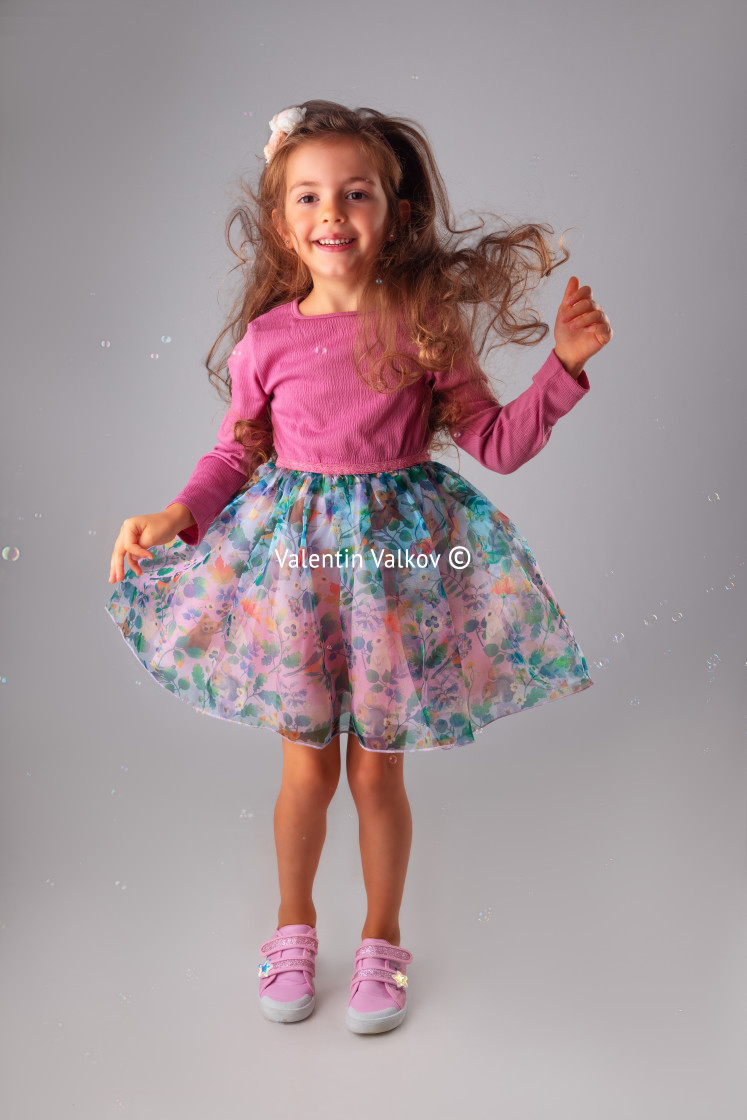 "Happy birthday girl in party dress portrait with copyspace for t" stock image