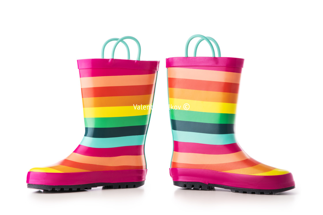 "Colorful kids rubber boots for rain isolated on white background" stock image