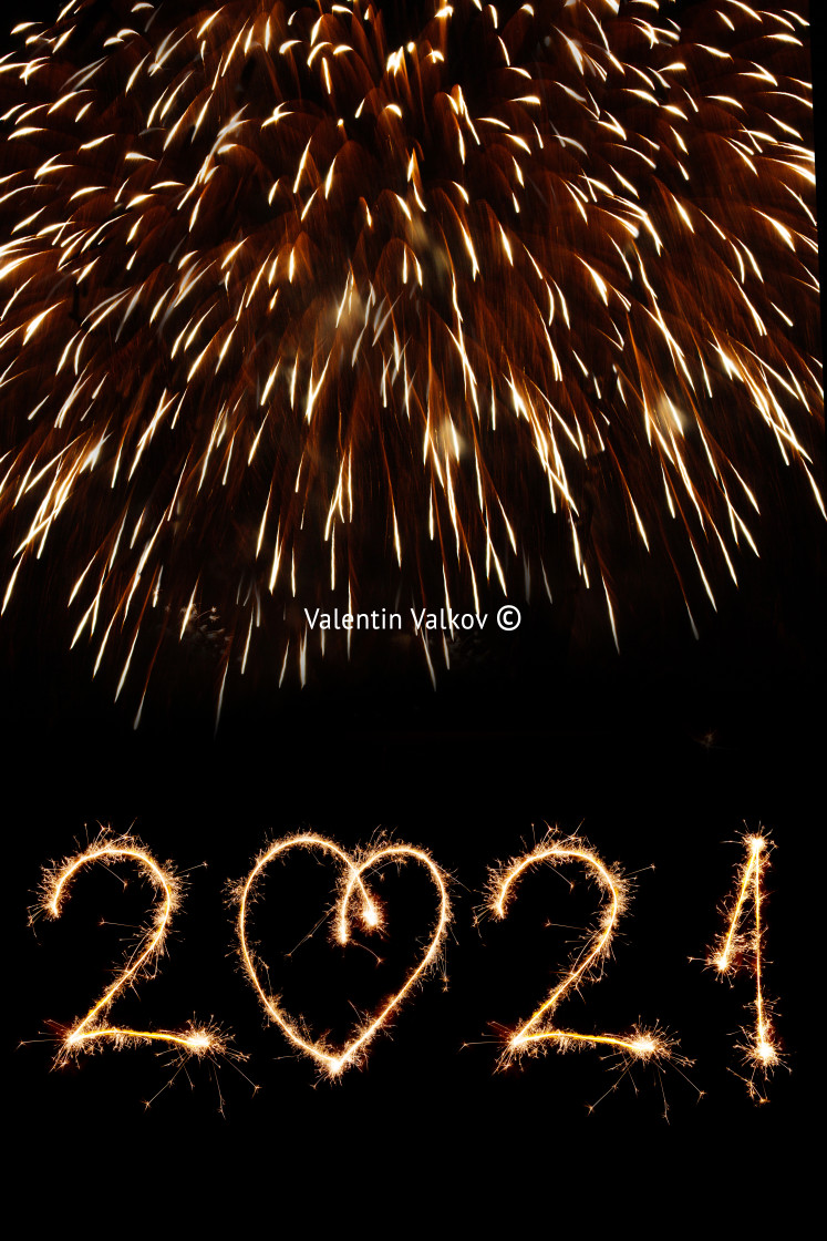 "2021 written with fireworks as a background" stock image