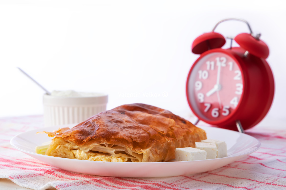 "Baked cheese pie with milk. Bulgarian butter banitsa for breakfa" stock image