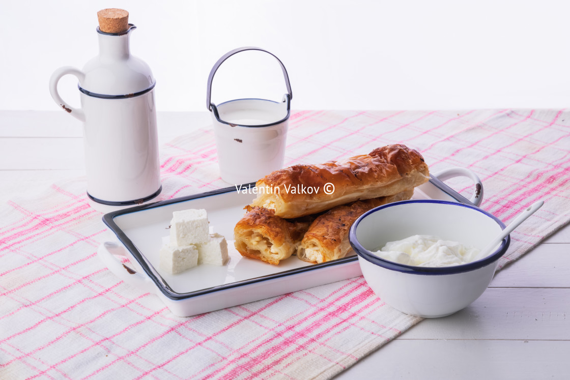 "Baked cheese pie with milk. Bulgarian butter banitsa for breakfa" stock image