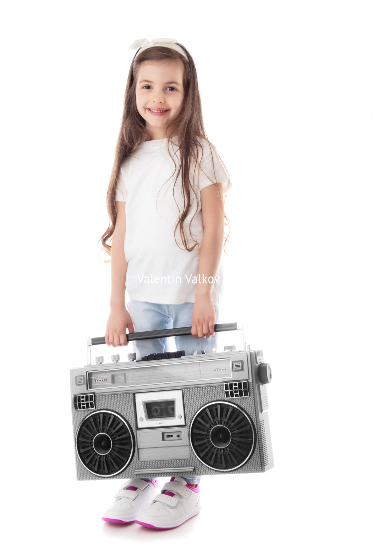 "Young hip hop girl listening music on boombox retro radio, ghett" stock image