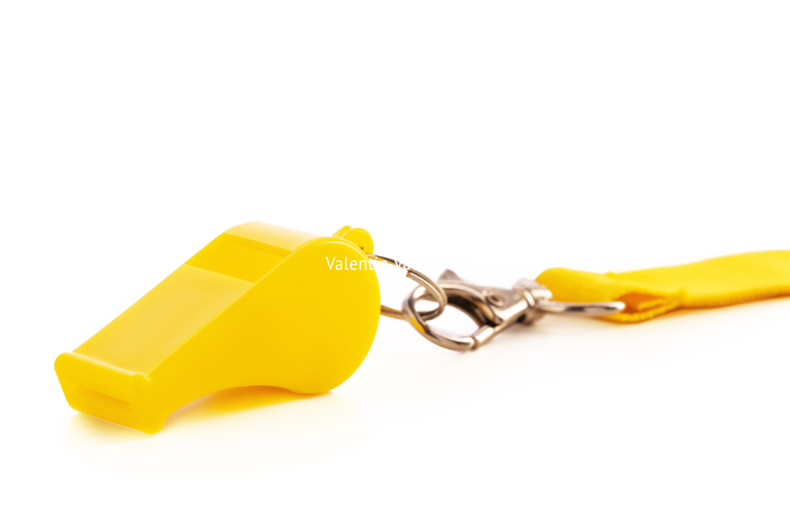 "Yellow sport whistle isolated on white background" stock image