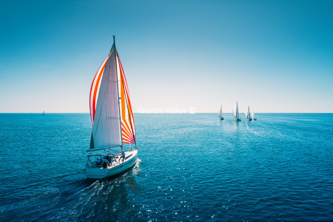 "Regatta sailing ship yachts with white sails at opened sea. Aeri" stock image