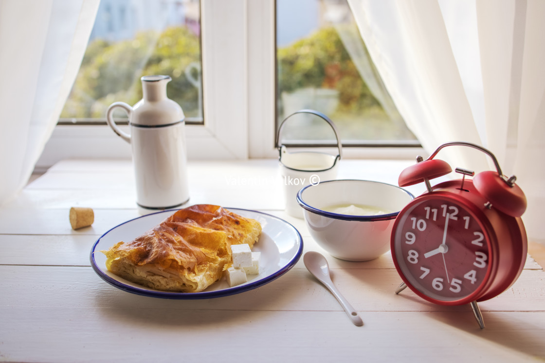 "Baked cheese pie with milk. Bulgarian butter banitsa for breakfa" stock image