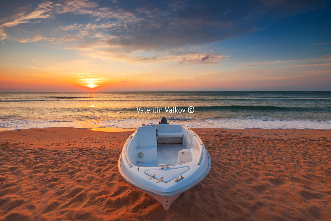 "Boat and sunrise" stock image