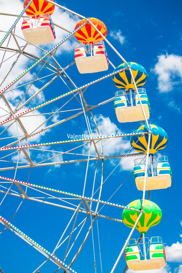 "Ferris Wheel with Blue Sky and clouds" stock image