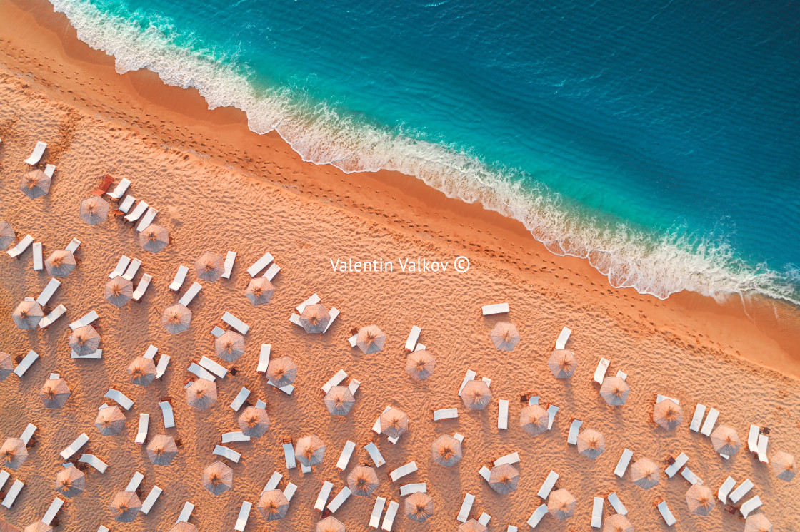 "Aerial top view from drone of sandy beach with turquoise sea wav" stock image