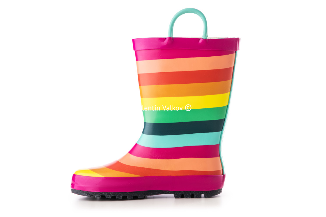 "Color kids rubber rain boots. Foot wear for children isolated" stock image