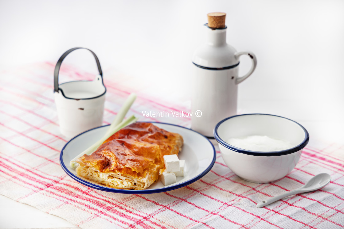 "Baked cheese pie with milk. Bulgarian butter banitsa for breakfa" stock image