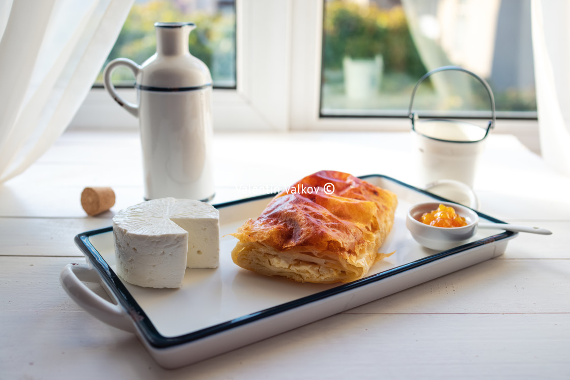 "Baked cheese pie with milk. Bulgarian butter banitsa for breakfa" stock image