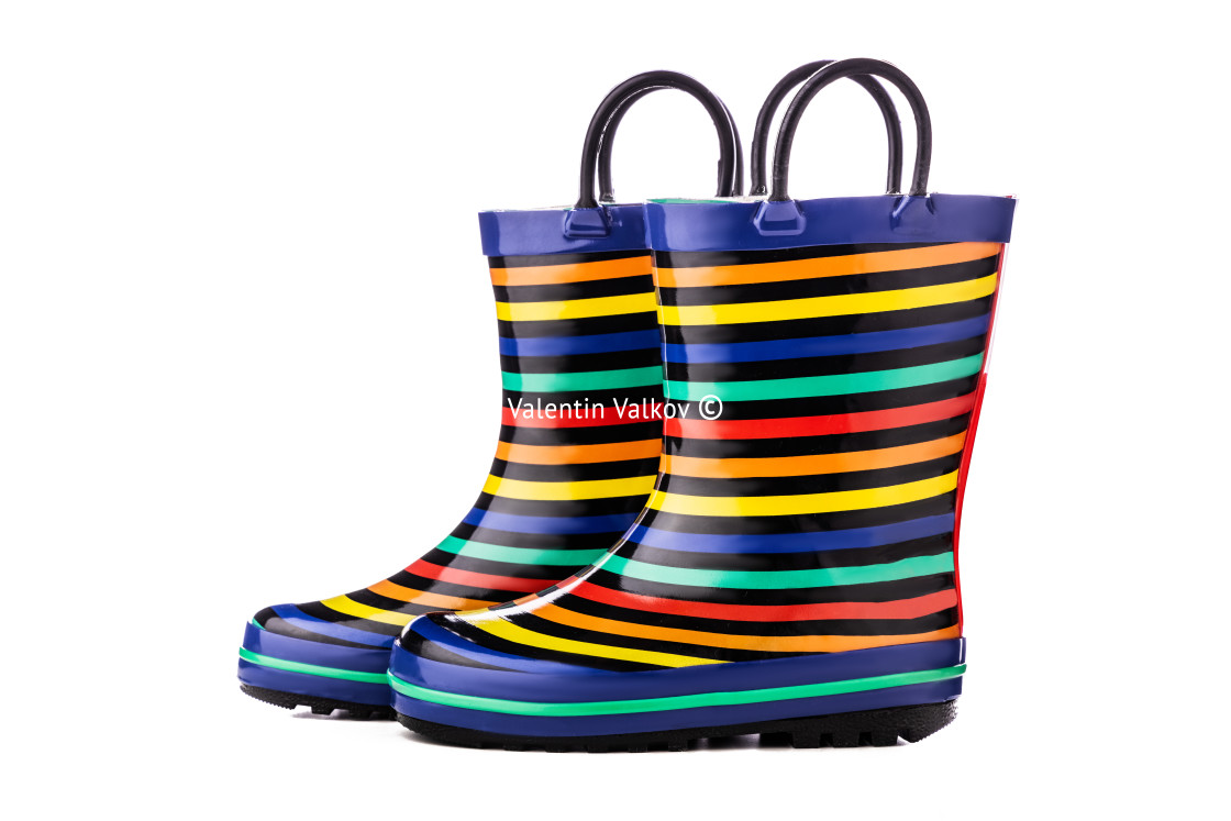 "Colorful kids rubber boots for rain isolated on white background" stock image