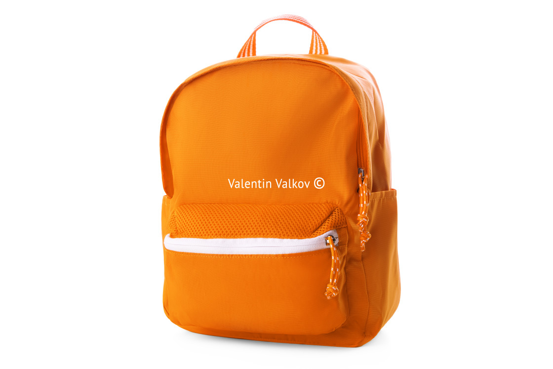 "Orange school backpack isolated on white" stock image