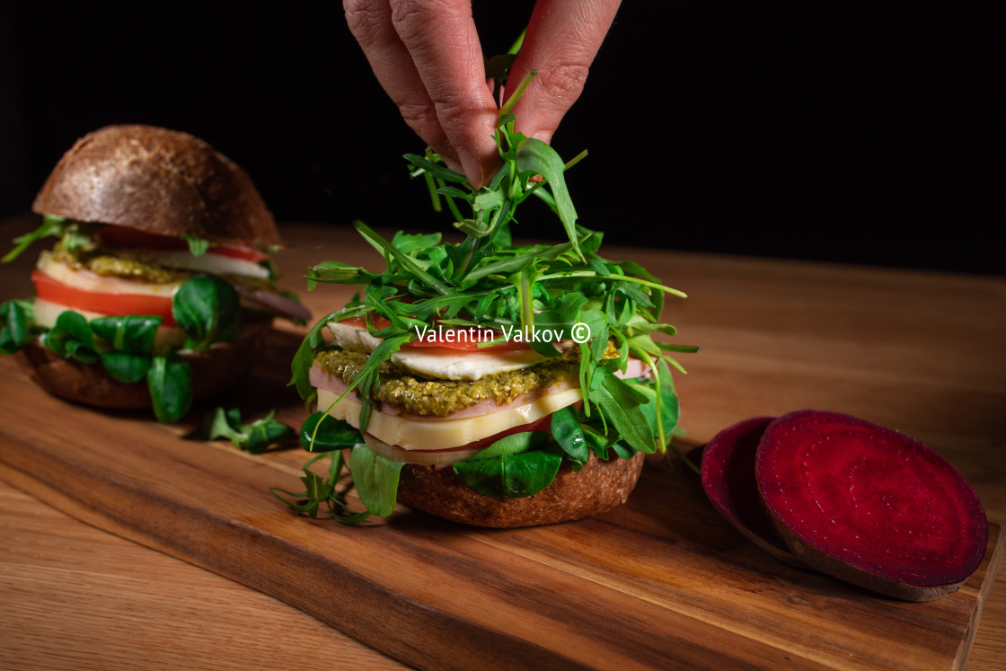 "Healthy Vegan Burger. Hamburgers on a wooden table." stock image