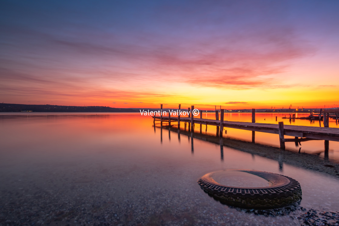 "Small Dock and the lake at sunset" stock image