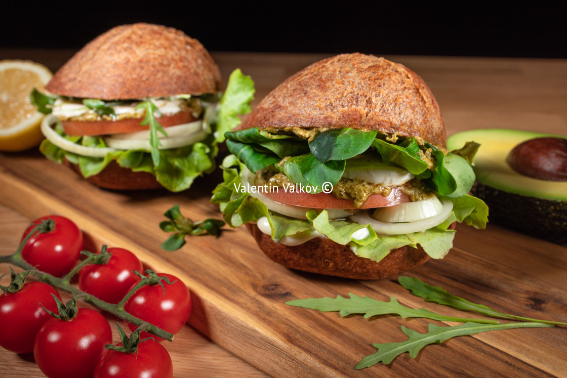 "Healthy Vegan Burger. Hamburgers on a wooden table." stock image