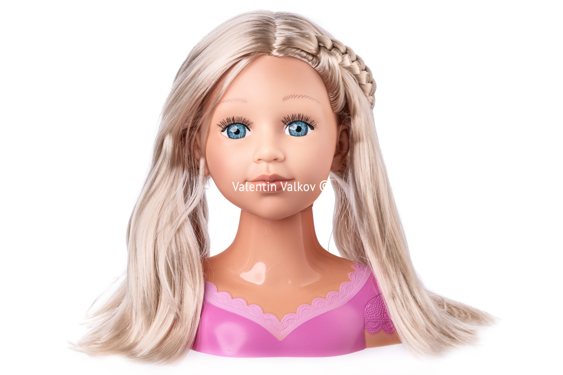 "Make-up and hairdressing head of a beautiful doll with real skin" stock image