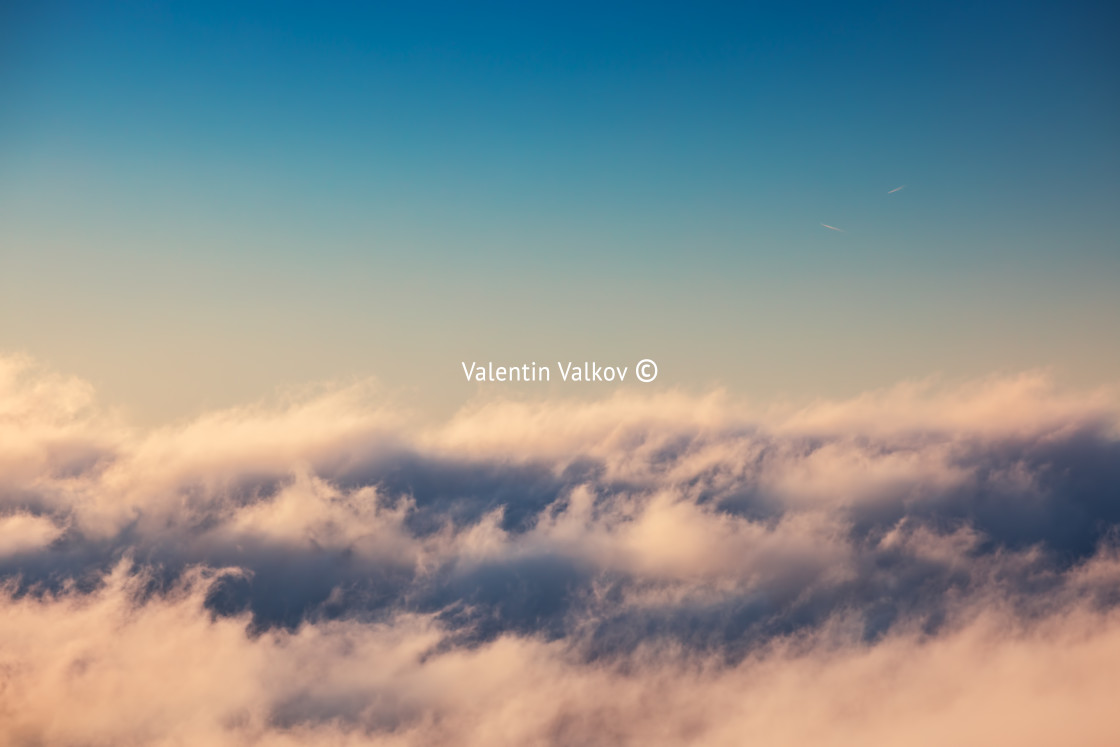 "Flying above the clouds" stock image