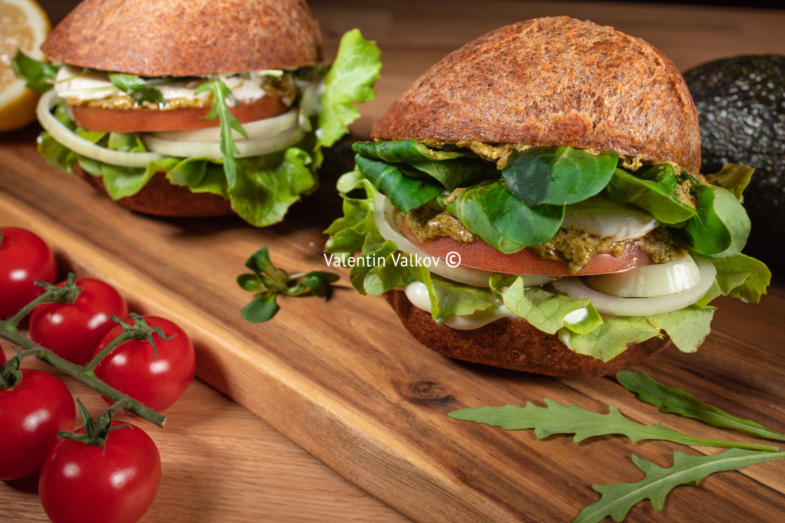 "Healthy Vegan Burger. Hamburgers on a wooden table." stock image