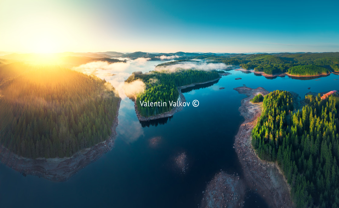 "Aerial view of morning fog on the lake, sunrise shot" stock image