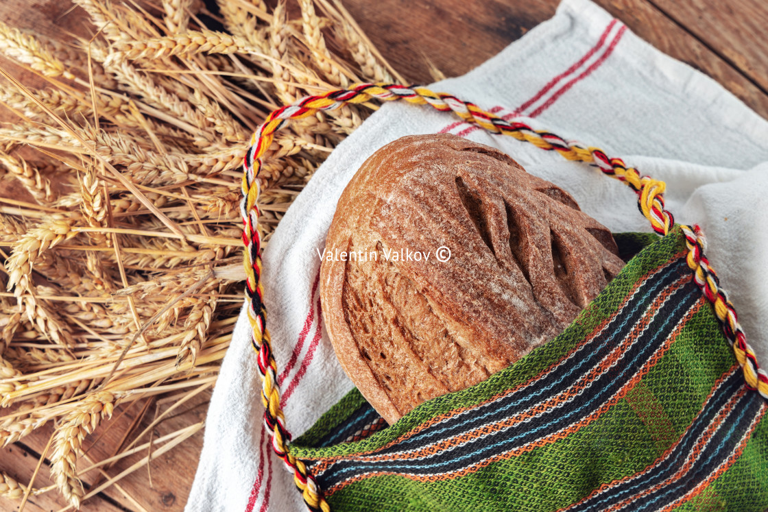 "Fresh oven baked homemade sourdough bread in folklore bag. Bulga" stock image