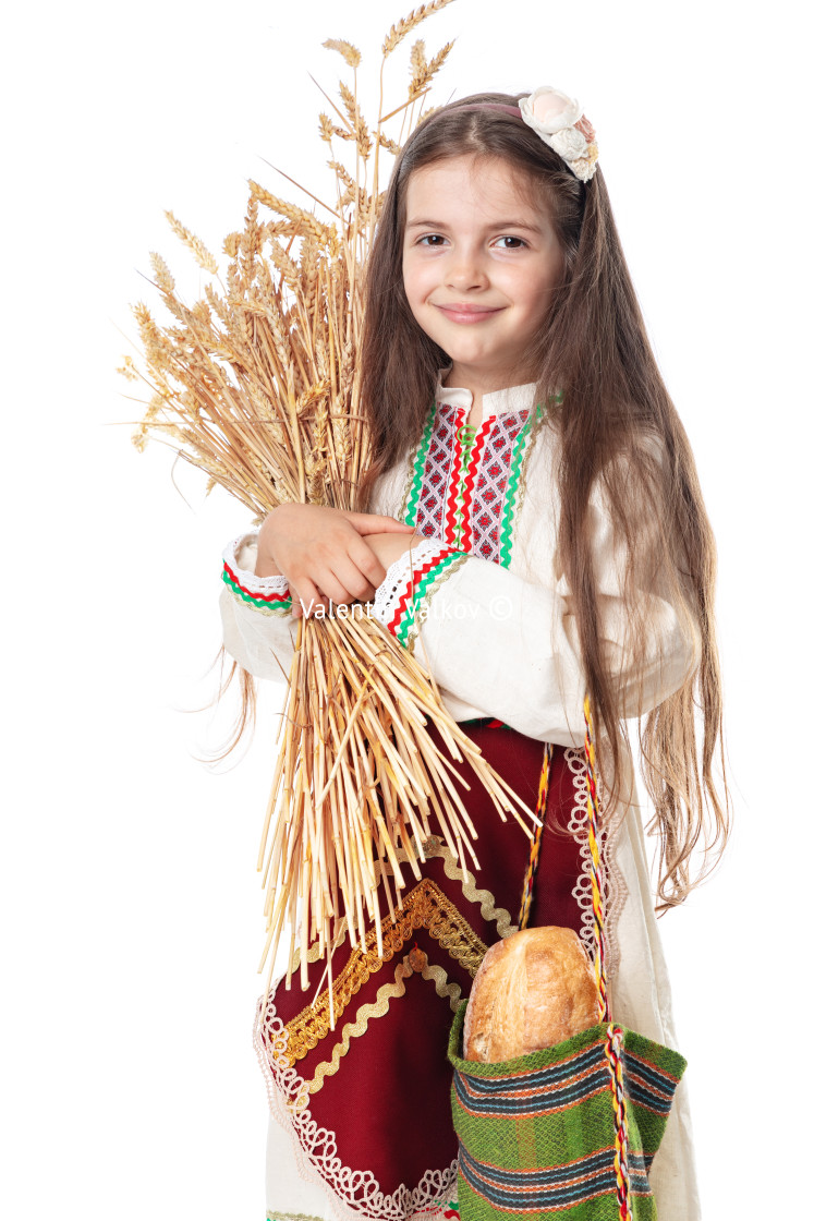 "Bulgarian woman or young girl in traditional folklore dress hol" stock image