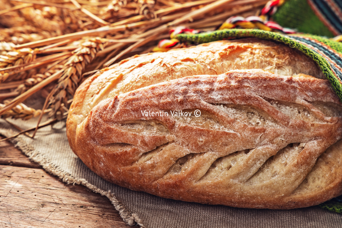 "Fresh oven baked homemade sourdough bread in folklore bag. Bulga" stock image