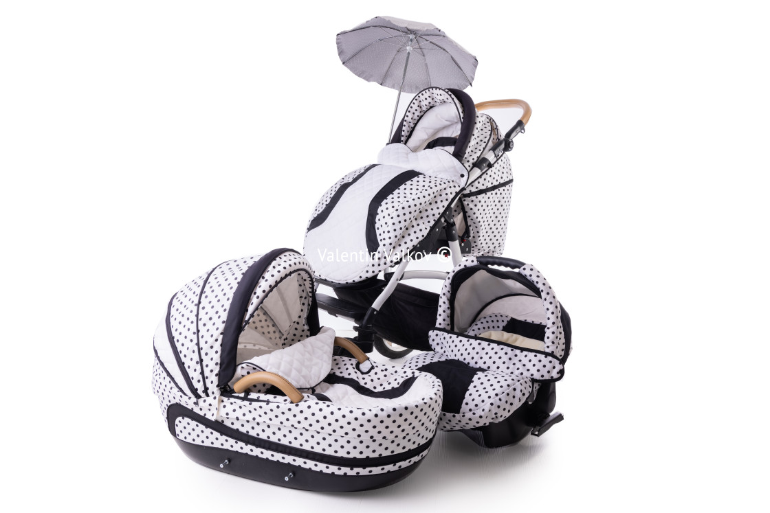 "Modern baby stroller with bassinet and car seat isolated on a wh" stock image