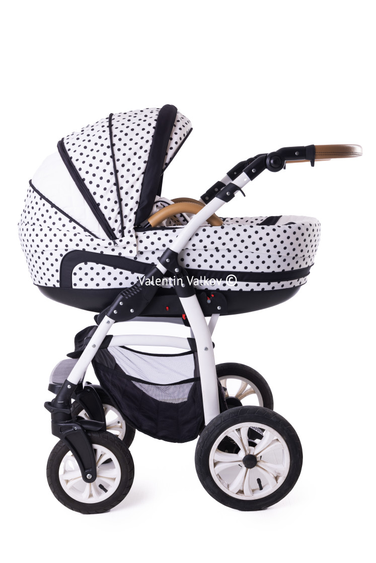 "Modern baby stroller with bassinet and car seat isolated on a wh" stock image