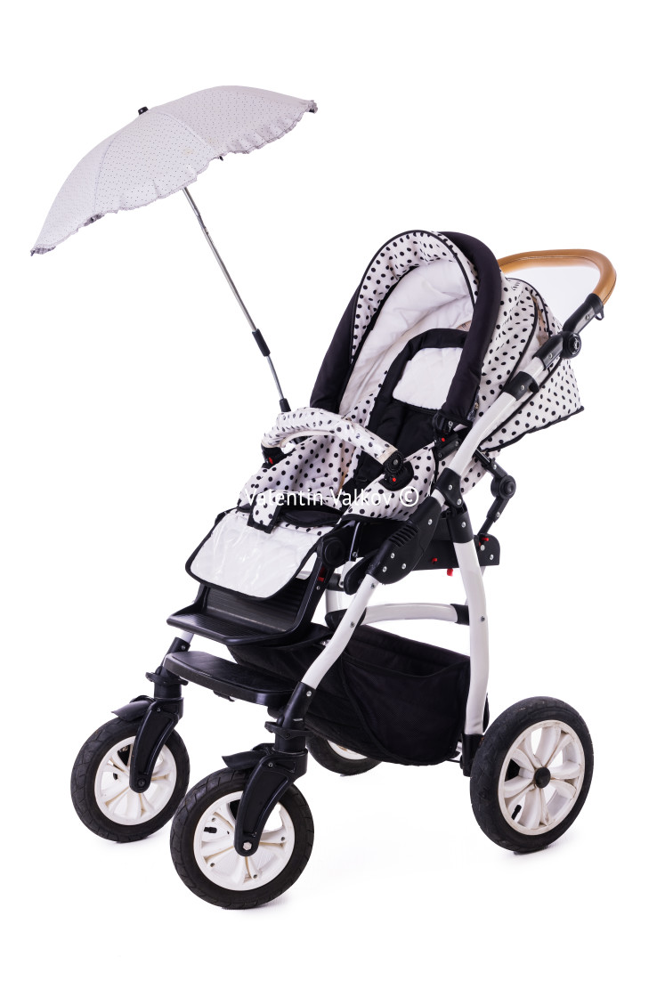 "Modern baby stroller with bassinet and car seat isolated on a wh" stock image