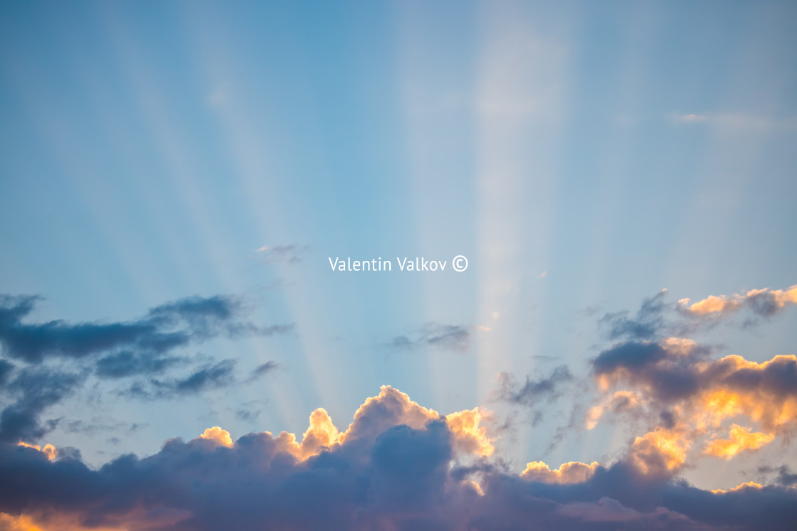 "Sunset dramatic sky clouds with sunbeam" stock image